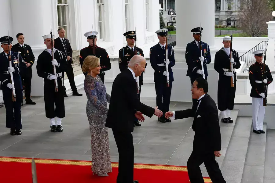 President Joe Biden and first lady Jill Biden welcome Japanese Prime Minister Fumio Kishida at the North Portico for an official State Dinner at the White House in Washington, U.S., April 10, 2024. REUTERS/Evelyn Hockstein