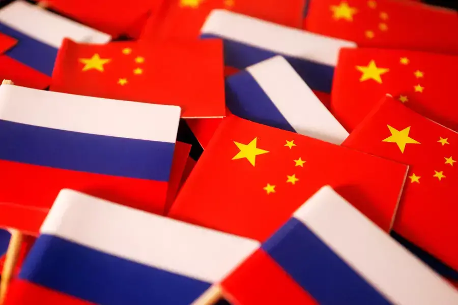Illustration of Chinese and Russian flags, taken March 24, 2022.