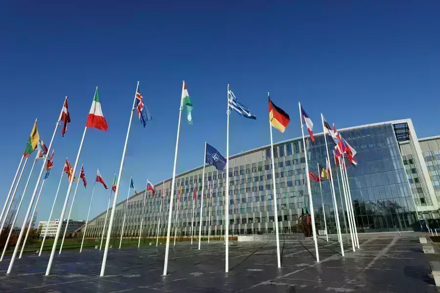 Flags fly outside NATO’s headquarters in Brussels, Belgium, on November 16, 2022.