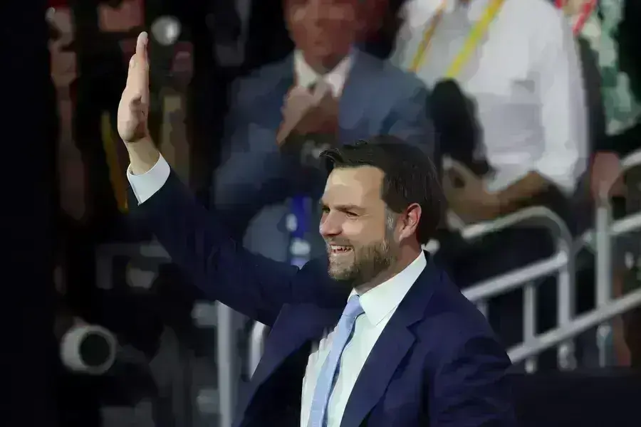 Republican vice-presidential nominee J.D. Vance waves to the crowd on the first day of the Republican National Convention at the Fiserv Forum in Milwaukee, Wisconsin, on July 15, 2024. 