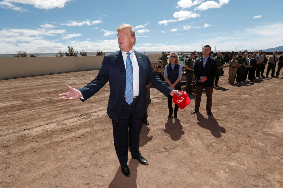 U.S. President Donald Trump speaks to reporters while visiting the U.S.-Mexico border in Calexico, California on April 5, 2019.