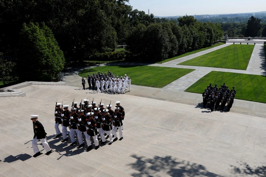 U.S. armed forces honor guards attend a ceremony at the Tomb of the Unknown Soldier in Arlington National Cemetery on August 23, 2024.