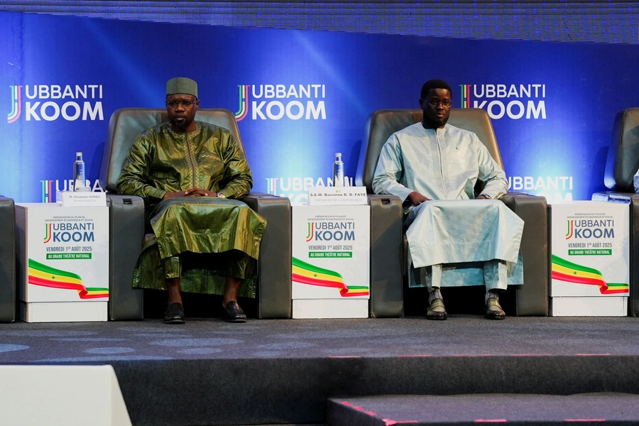 Senegal's Prime Minister Ousmane Sonko sits with Senegal's President Bassirou Diomaye Faye, on the day he presents an economic recovery plan that will be implemented without incurring additional debt in Dakar, Senegal on August 1, 2025. 